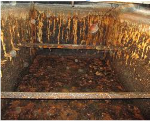 An image showing Galvanic Corrosion in a water tank