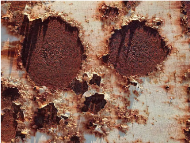 An image showing Pitting Corrosion in a water tank